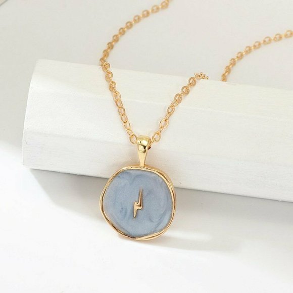 Jewelry - NWOT Gold Baby Blue Medallion Lightning Necklace